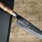<span class="title">New Face! Takeshi Saji R2 Mirror Hammered Stylish Bunka Knife with Austerely Elegant Karin Handle</span>