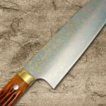 <span class="title">Takeshi Saji VG10 Rainbow-Colored Damascus Chef Knives with Orange Antler Handle</span>